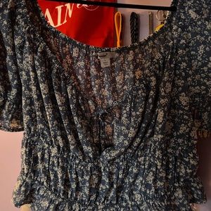 Cute blue shirt with flowers